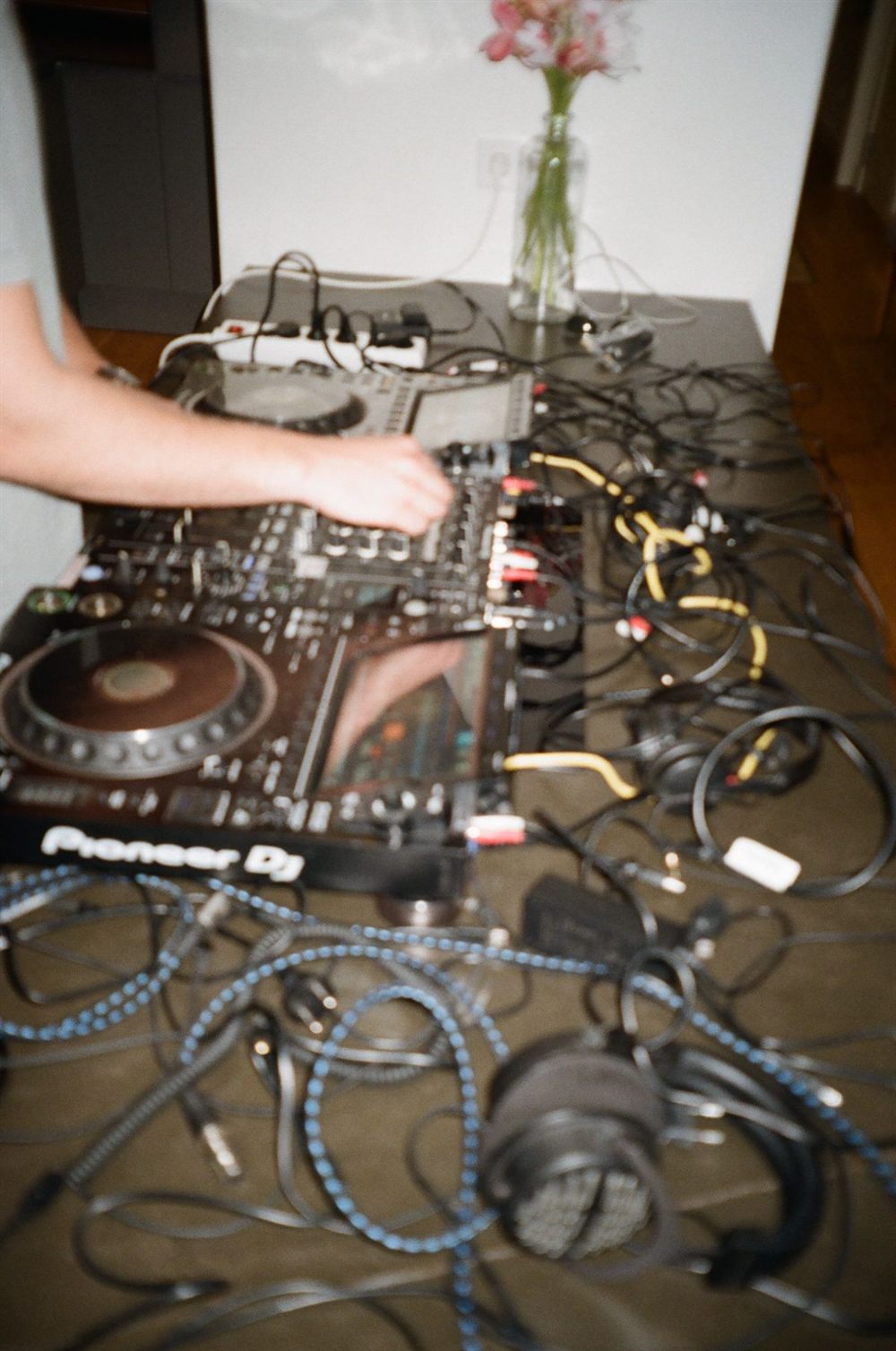 the whole rig on one table: mixer, cd players, cables